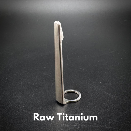 Photo of raw titanium machined pen clip